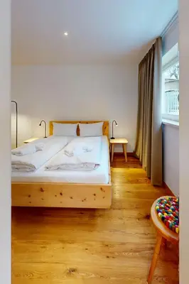 Ein Bett oder Betten in einem Zimmer der Unterkunft GipfelWerk