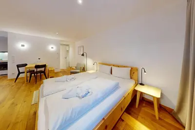 Ein Bett oder Betten in einem Zimmer der Unterkunft GipfelWerk