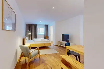 Ein Bett oder Betten in einem Zimmer der Unterkunft GipfelWerk