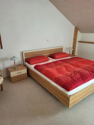 Ein Bett oder Betten in einem Zimmer der Unterkunft Ferienwohnung Czanderl