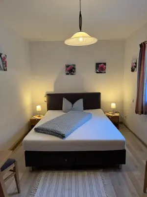Ein Bett oder Betten in einem Zimmer der Unterkunft Gasthaus Stoiber