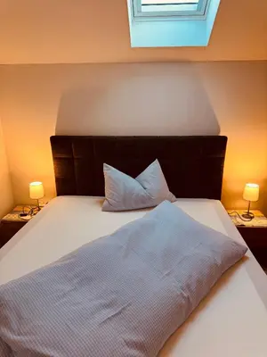Ein Bett oder Betten in einem Zimmer der Unterkunft Gasthaus Stoiber