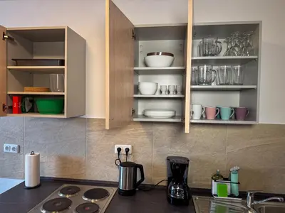 Küche/Küchenzeile in der Unterkunft C4S - COME4STAY - Töging - InnStay - 3 Zi Apartment in Töging - 7Personen - Küche - Badezimmer - Balkon - SmartTV - WLAN