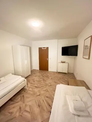Ein Bett oder Betten in einem Zimmer der Unterkunft C4S - COME4STAY - Töging - InnStay - 3 Zi Apartment in Töging - 7Personen - Küche - Badezimmer - Balkon - SmartTV - WLAN