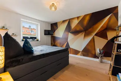 TV/Unterhaltungsangebot in der Unterkunft Wohlfühl- und Workout Appartement mit Balkon