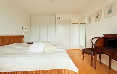 Ein Bett oder Betten in einem Zimmer der Unterkunft Bodenschneidsuiten Wanderslust