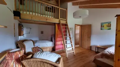 Ein Bett oder Betten in einem Zimmer der Unterkunft Ferienwohnung mit Bergblick