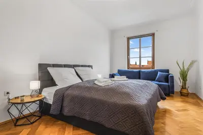 Ein Bett oder Betten in einem Zimmer der Unterkunft Urbanes Loft im Herzen der historischen Altstadt