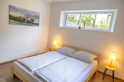 Ein Bett oder Betten in einem Zimmer der Unterkunft Brei Haus