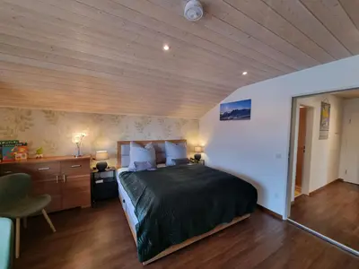 Ein Bett oder Betten in einem Zimmer der Unterkunft Zugspitze 6 mit SAUNA in Farchant bei GarmischPartenkirchen