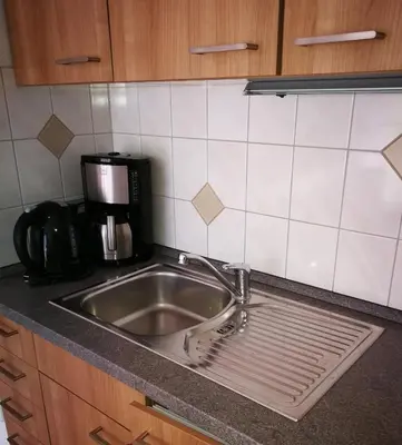 Küche/Küchenzeile in der Unterkunft Döllelhof Erding