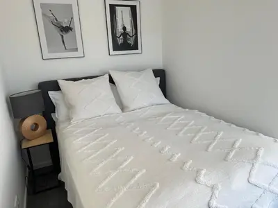 Ein Bett oder Betten in einem Zimmer der Unterkunft Comfort City Living