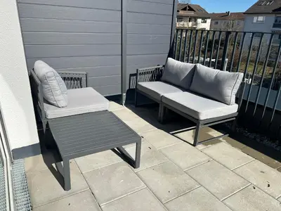 Ein Sitzbereich in der Unterkunft Comfort City Living