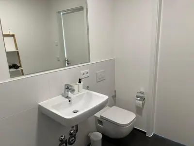 Ein Badezimmer in der Unterkunft Comfort City Living