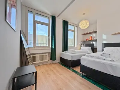Ein Bett oder Betten in einem Zimmer der Unterkunft Flatista Homes - Clemens