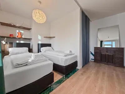 Ein Bett oder Betten in einem Zimmer der Unterkunft Flatista Homes - Clemens