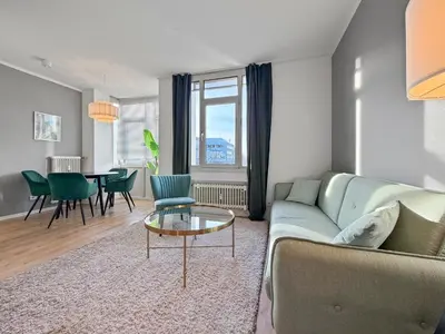 Ein Sitzbereich in der Unterkunft Flatista Homes - Clemens