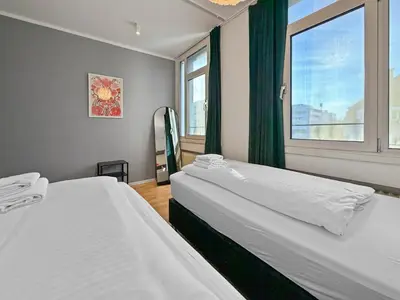 Ein Bett oder Betten in einem Zimmer der Unterkunft Flatista Homes - Clemens