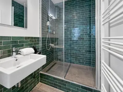 Ein Badezimmer in der Unterkunft Flatista Homes - Clemens