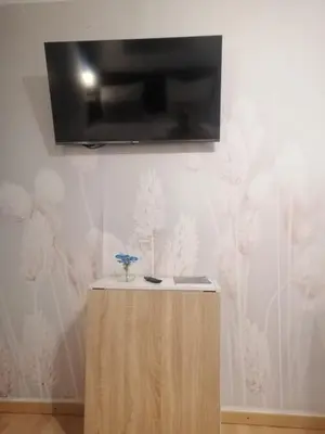 TV/Unterhaltungsangebot in der Unterkunft Modern Living Göggingen, 4 Min zur Messe, Tram 50m