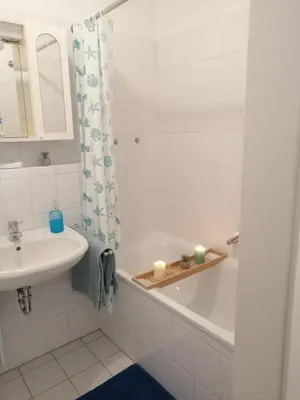 Ein Badezimmer in der Unterkunft Modern Living Göggingen, 4 Min zur Messe, Tram 50m