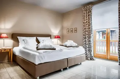 Ein Bett oder Betten in einem Zimmer der Unterkunft Central Park - Alpine Apartment
