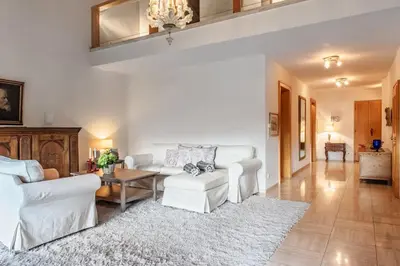 Ein Sitzbereich in der Unterkunft Central Park - Alpine Apartment