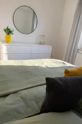 Ein Bett oder Betten in einem Zimmer der Unterkunft Luxus Apartment - Charmante 2 ZKB Ferienwohnung