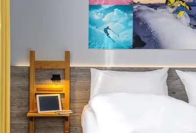 Ein Bett oder Betten in einem Zimmer der Unterkunft Felix Hotel Kaufbeuren