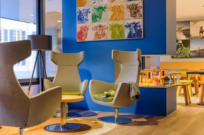 Ein Sitzbereich in der Unterkunft Felix Hotel Kaufbeuren