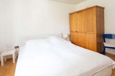 Ein Bett oder Betten in einem Zimmer der Unterkunft Ferienwohnung Saskia