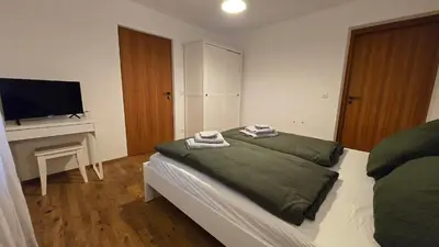 Ein Bett oder Betten in einem Zimmer der Unterkunft Wirt zSeifriedswörth