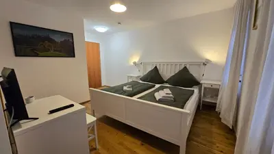 Ein Bett oder Betten in einem Zimmer der Unterkunft Wirt zSeifriedswörth