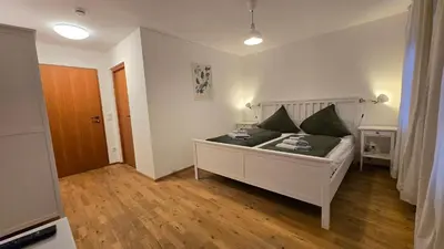 Ein Bett oder Betten in einem Zimmer der Unterkunft Wirt zSeifriedswörth