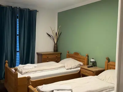 Ein Bett oder Betten in einem Zimmer der Unterkunft Weissenfelder Guest House & Restaurant