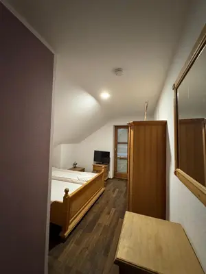 Ein Bett oder Betten in einem Zimmer der Unterkunft Weissenfelder Guest House & Restaurant