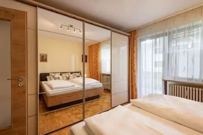 Ein Bett oder Betten in einem Zimmer der Unterkunft Panoramagarten mit einem Traum Blick