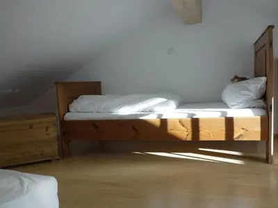 Ein Bett oder Betten in einem Zimmer der Unterkunft Apartment Familien Domizil by Interhome
