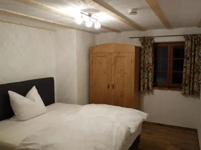 Ein Bett oder Betten in einem Zimmer der Unterkunft Apartment Familien Domizil by Interhome