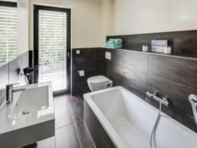 Ein Badezimmer in der Unterkunft Apartment in Holzhausen mit Terrasse by Interhome