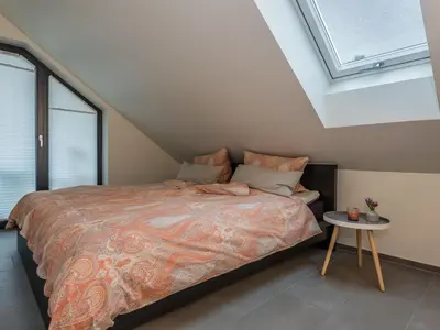 Ein Bett oder Betten in einem Zimmer der Unterkunft Apartment Charmante Wohnung in Holzhausen mit Grill by Interhome