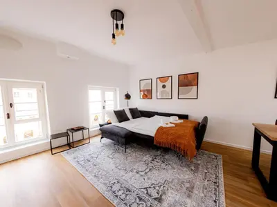 Ein Bett oder Betten in einem Zimmer der Unterkunft Apartment Highlight - Come4Stay - Mühldorf Stadtblick by Interhome