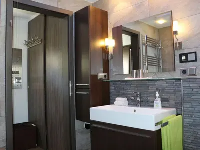 Ein Badezimmer in der Unterkunft Apartment Maisonette Deluxe by FeWo-Amperland by Interhome