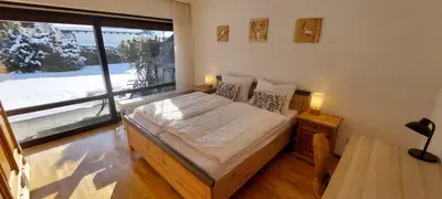 Ein Bett oder Betten in einem Zimmer der Unterkunft Wohnung Alpensteyn I
