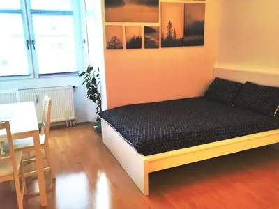 Ein Bett oder Betten in einem Zimmer der Unterkunft Beautiful Cozy Flat in Munich