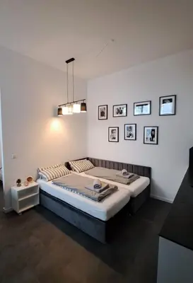 Ein Bett oder Betten in einem Zimmer der Unterkunft Nordic Stay Suite