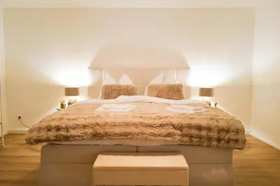 Ein Bett oder Betten in einem Zimmer der Unterkunft Spacious City Apartment Parking WiFi 6 Pax