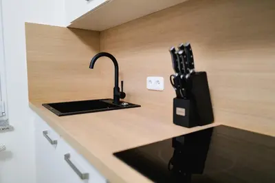 Küche/Küchenzeile in der Unterkunft Spacious City Apartment Parking WiFi 6 Pax
