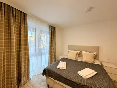 Ein Bett oder Betten in einem Zimmer der Unterkunft GG Apartment 7