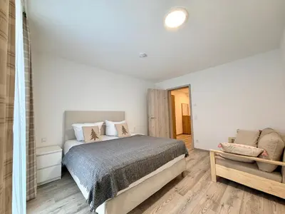 Ein Bett oder Betten in einem Zimmer der Unterkunft GG Apartment 7
